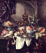 Still life with fruit, roast, silver- and glassware, porcelain and columbine cup on a dark tablecloth with white serviette. Abraham van Beijeren